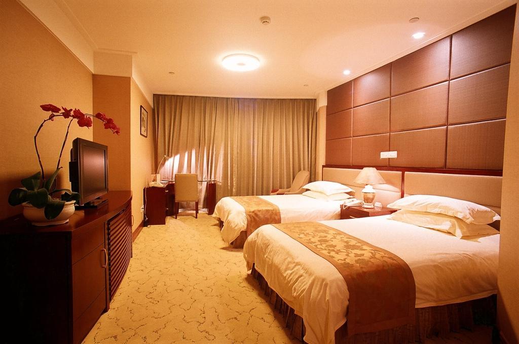 Shanghai Hengsheng Peninsula International Hotel Номер фото